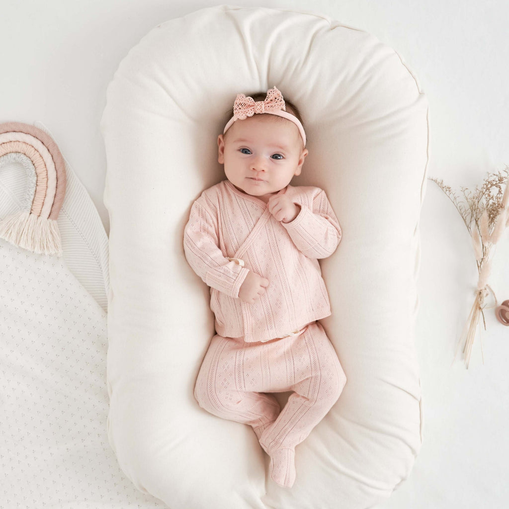 Elegant Baby Pink Organic Pointelle Layette Bag Set, folded
