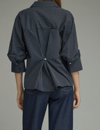 Navy striped blouse with three-quarter sleeves and button cuff detail