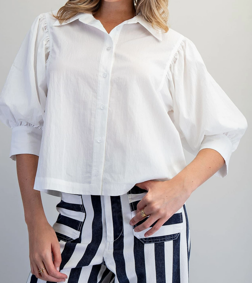 Off-white boxy puff-sleeve button-down top, front view