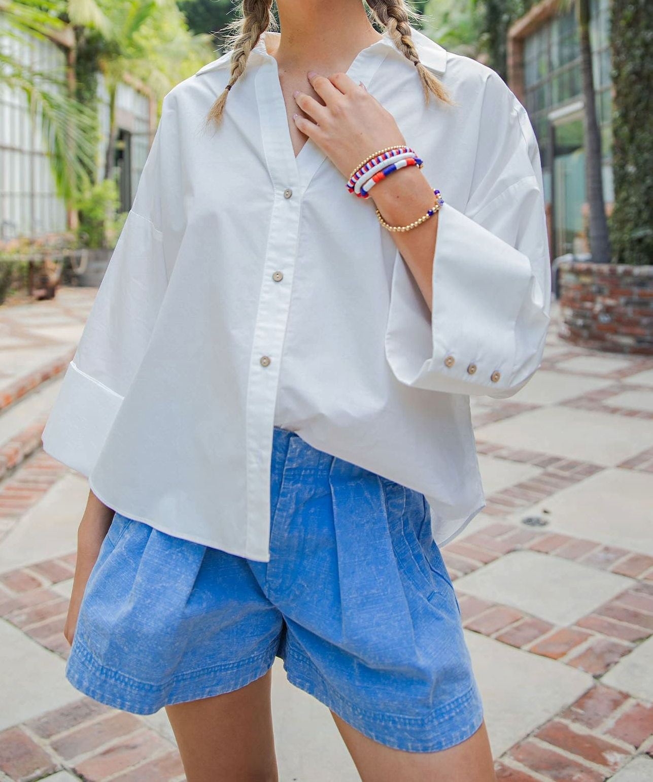 Button-down blouse with back-pleat detail, front view